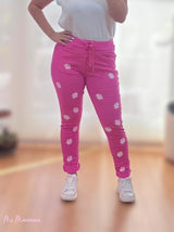 JEANS STROPICCIATO FUCSIA CON MARGHERITE BIANCHE