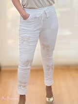 JEANS ARRUGADOS LAZOS BLANCO