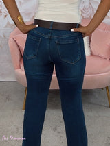 JEANS CON CUCITURA CENTRALE GAMBA LARGA