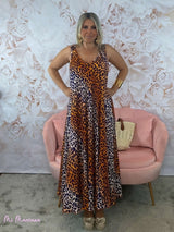 VESTIDO ANIMAL PRINT ESCOTE PICO MORADO