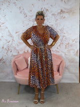 VESTIDO OVERSIZE ANIMAL PRINT OBLICUO  ESCOTE PICO MANGAS