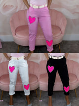 PANTALÓN ELÁSTICO CORAZONES FLUOR PURPURINA